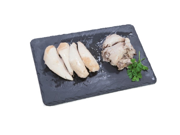 Boneless partridge Guijarro in glass with extra virgin olive oil.